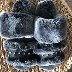 EMU rhinestone slippers.